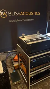 Angled view of the new ITO rack supporting audio components at the Bliss Acoustics display.